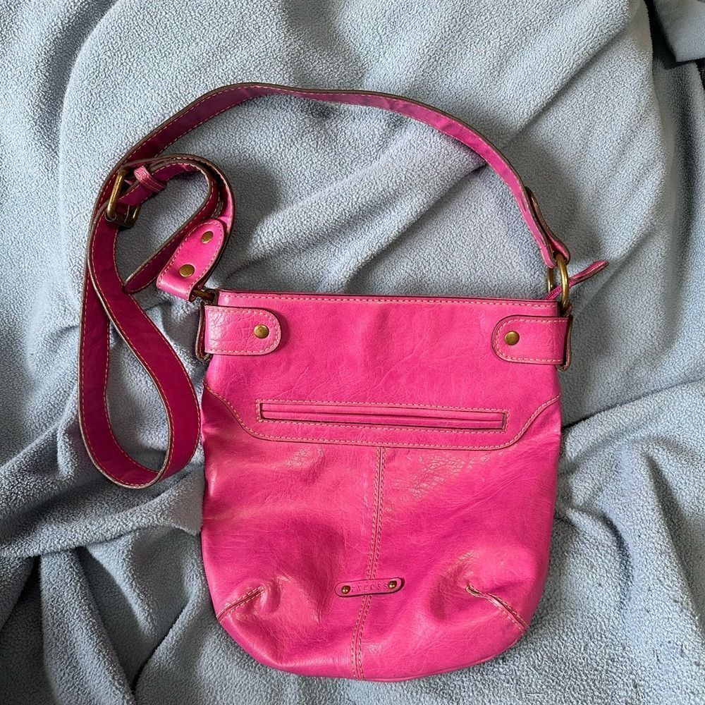 Magenta faux leather bag.